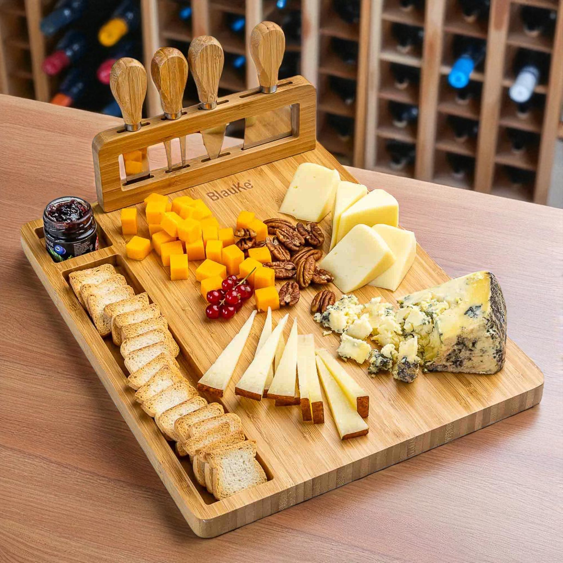 Wooden charcuterie board with assorted cheeses, fruits, and bread on a wooden surface.