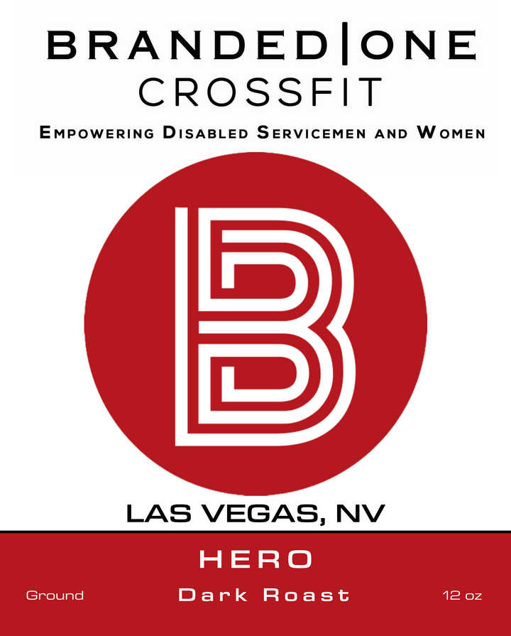 Branded One CrossFit Hero Dark Roast coffee label, 12 oz ground bag design with bold red “B” logo, supporting disabled servicemen and women, specialty dark roast coffee from Las Vegas, NV.