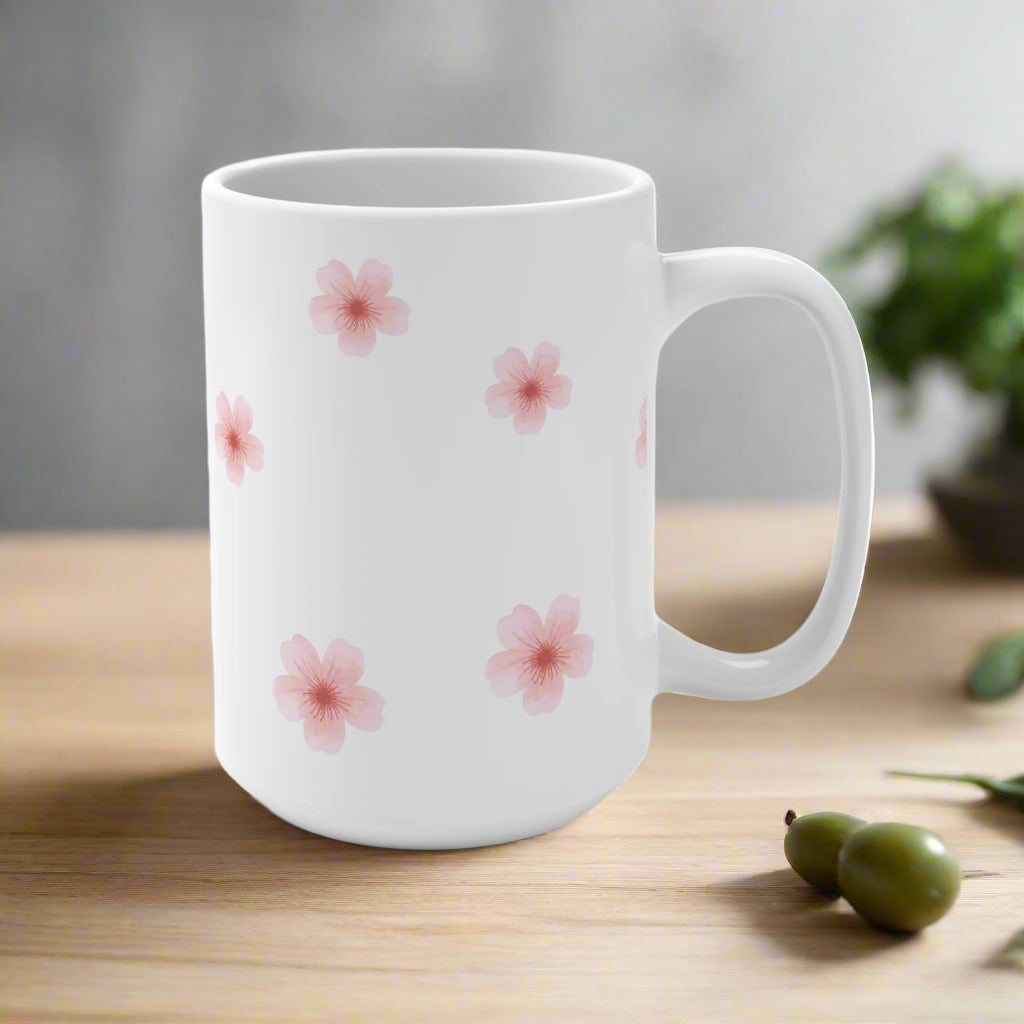 Backside of a White mug with pink floral patterns