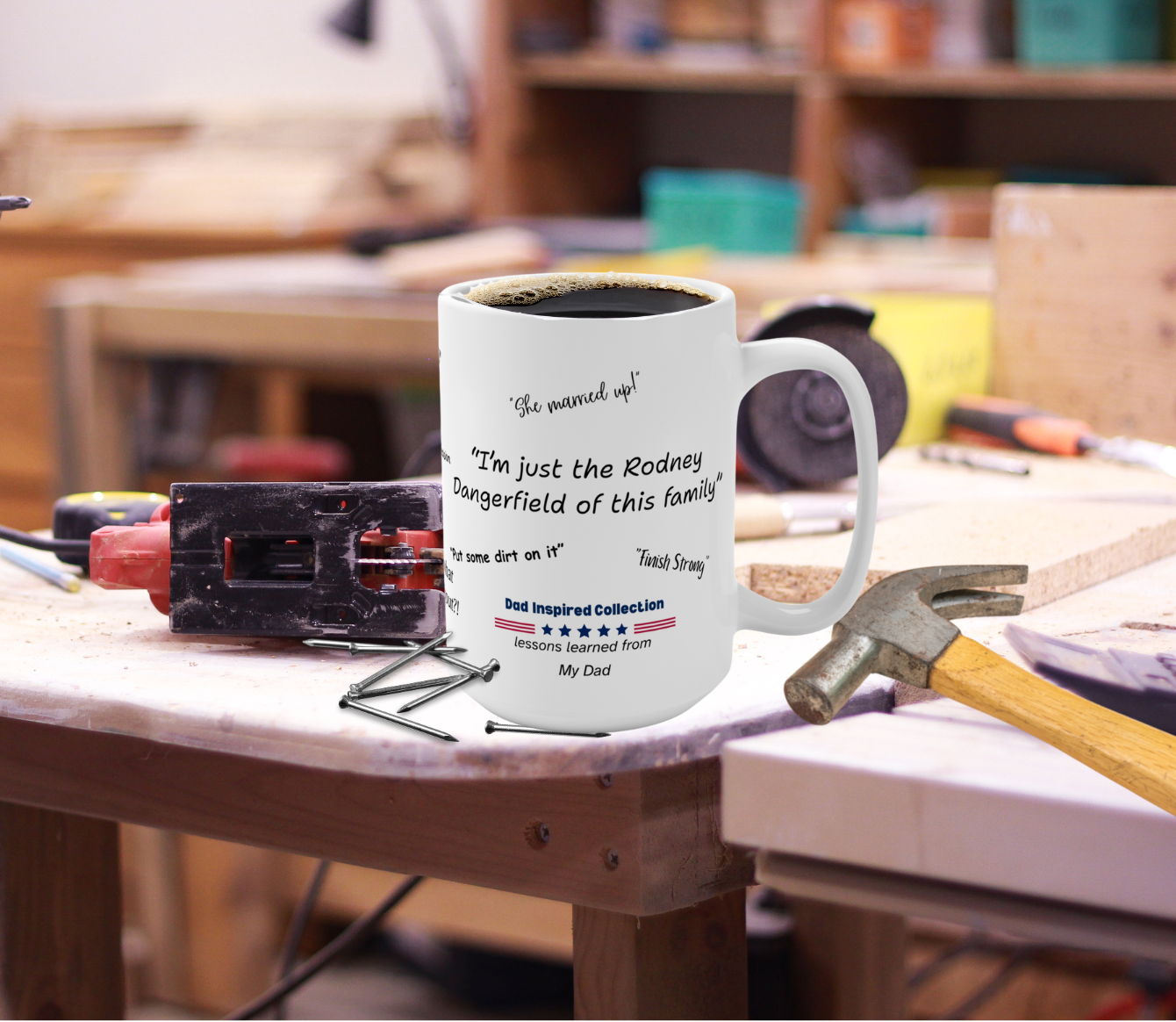White mug with text on a workbench with tools in a workshop