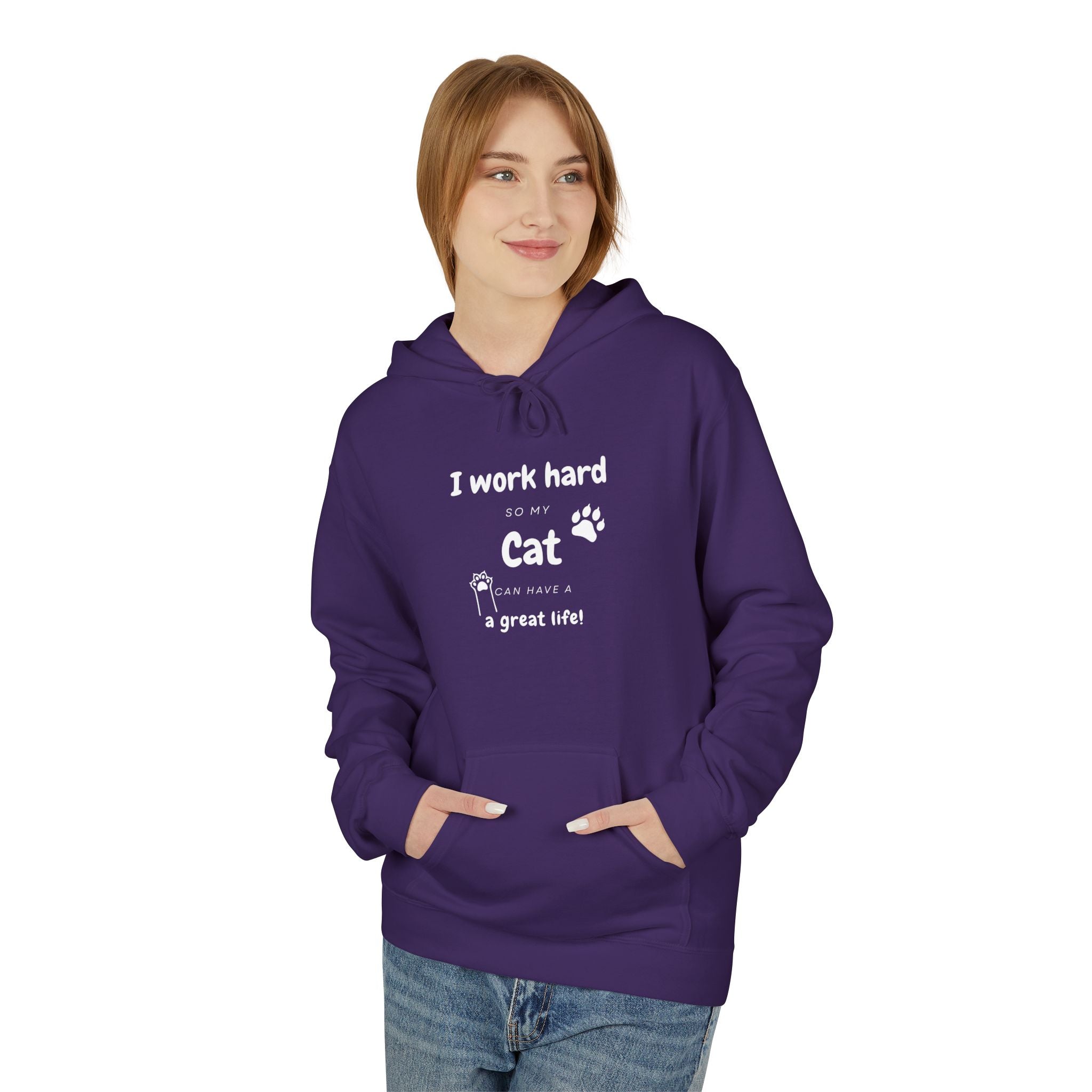 Woman wearing purple hoodie with text “I work hard so my cat can have a great life,” featuring cat paw print — cozy cat lover gift sweatshirt.