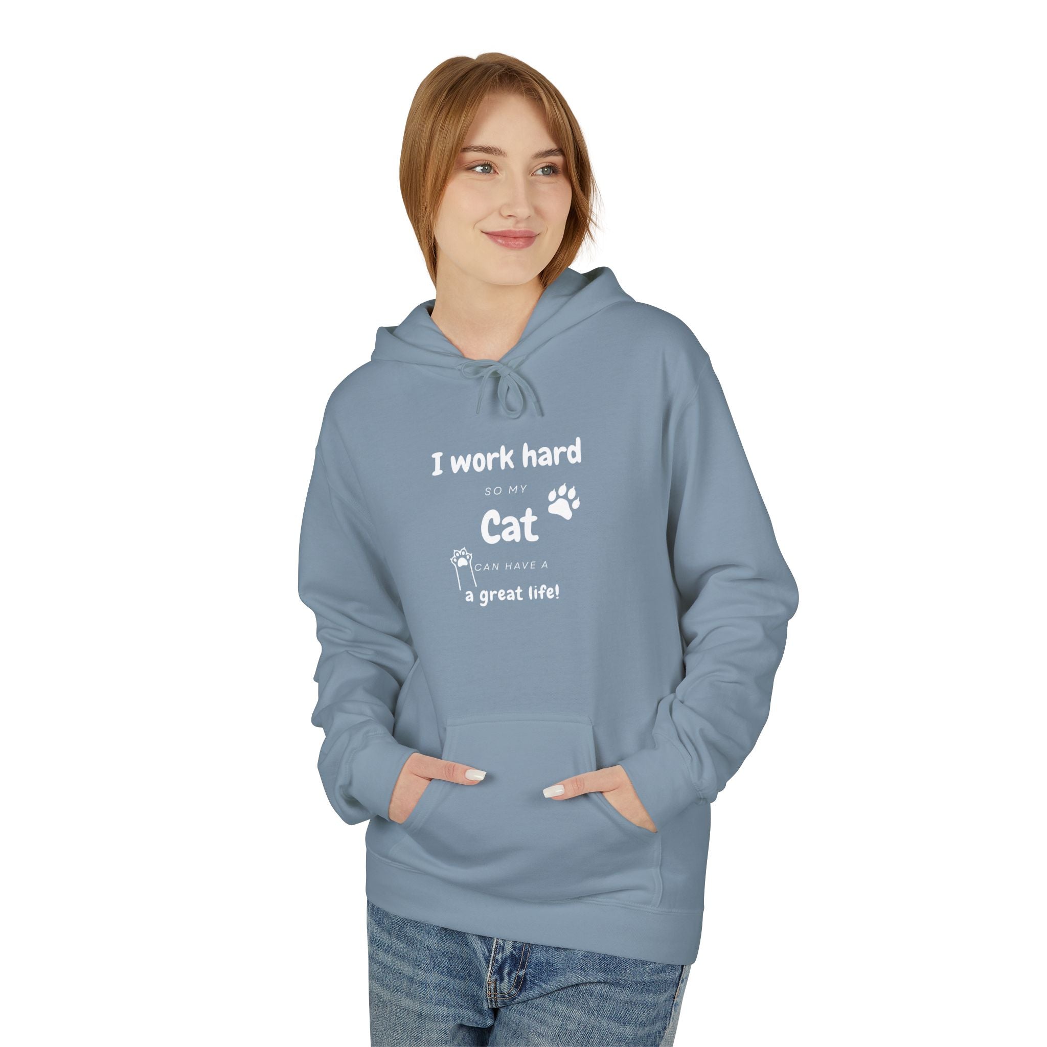 Woman wearing steel blue hoodie with text “I work hard so my cat can have a great life,” featuring cat paw print — cozy cat lover gift sweatshirt.