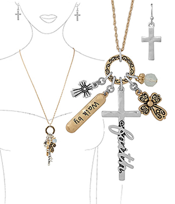 A set of religious-themed jewelry displayed on a mannequin torso, featuring multiple necklaces with charms such as a cross and a name pendant, along with matching earrings.