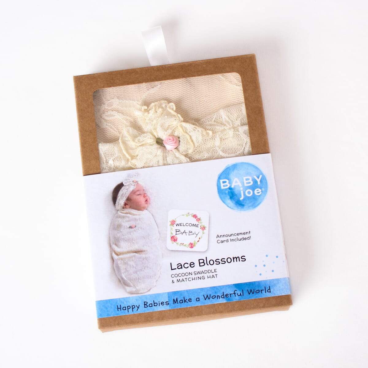 Baby cocoon swaddle set in packaging, with the product visible through a clear window. The set includes a beige-colored baby swaddle and matching headpiece, with a 'Lace Blossoms' label and the BABYjoe logo displayed.