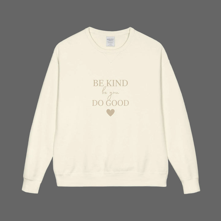 Be Kind Do Good Crewneck Sweatshirt in cream color with a motivational message design.