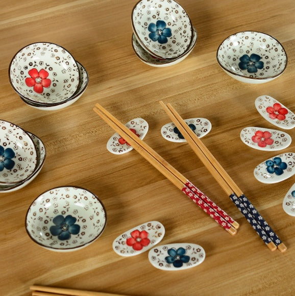 Beautiful ceramic sushi tableware with chopsticks and patterned bowls
