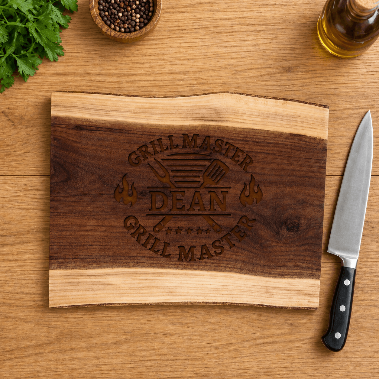 Personalized black walnut cutting board engraved with Grill Master design on kitchen counter beside chef knife