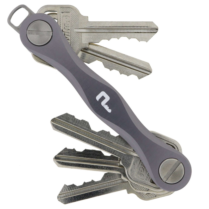 Gray PocketPro Edge slim aluminum key organizer holding multiple keys in compact quiet pocket-friendly design