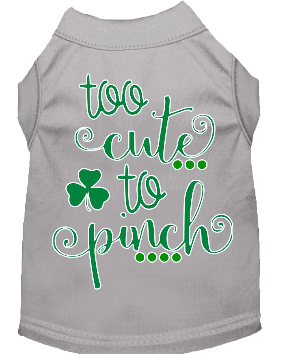 Gray dog shirt with green text and shamrock on a white background