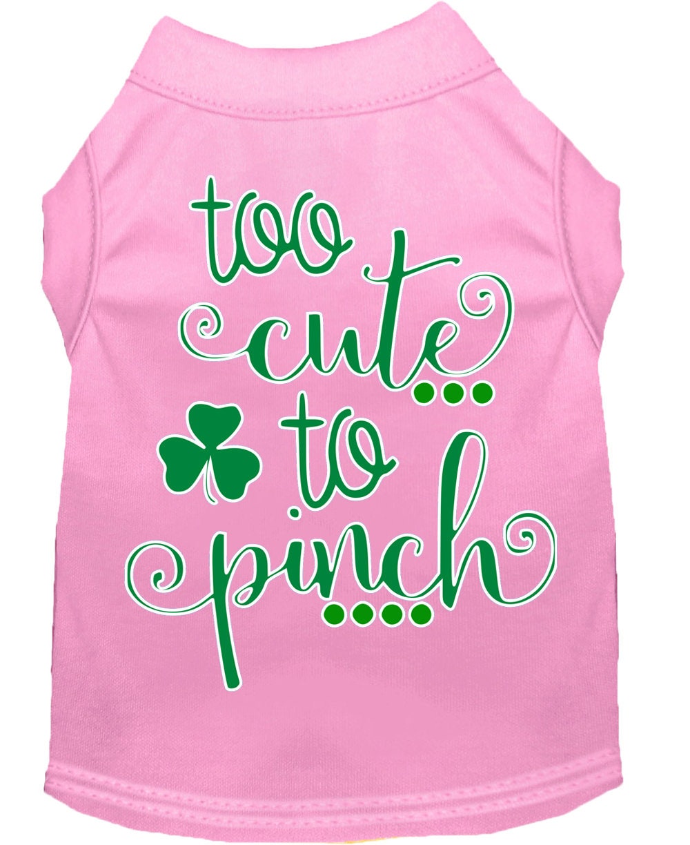 Pink dog tank top with green text and shamrock on a white background