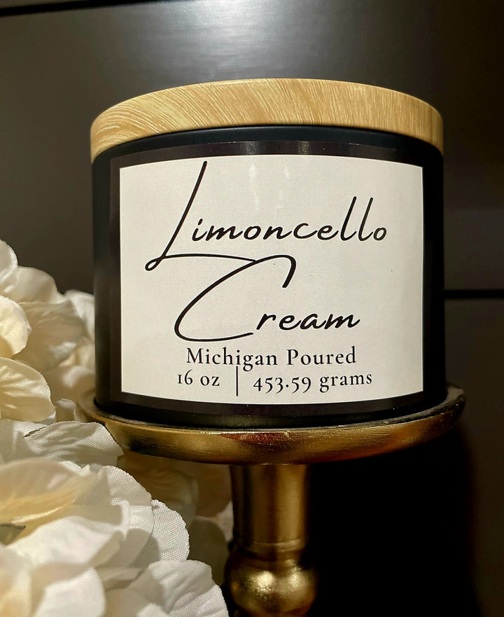 Limoncello Cream 16 oz soy candle in black jar with wooden lid, Michigan poured, minimalist white label design, hand-poured aromatherapy candle with warm smoky fragrance, rustic home décor and gift idea.