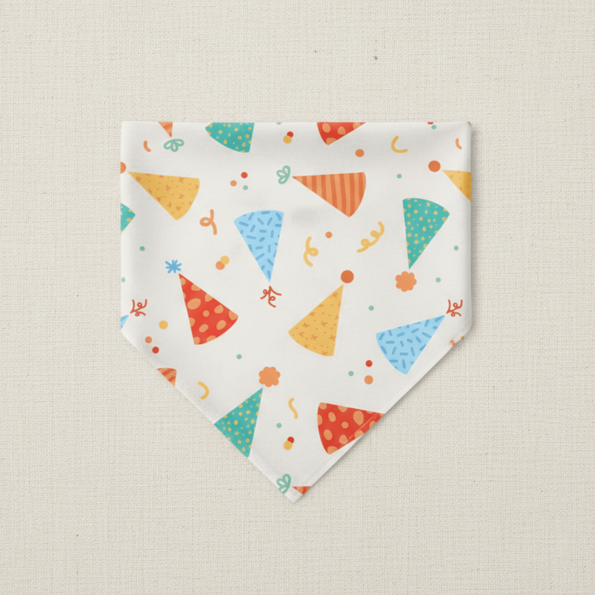 Colorful patterned bandana on a beige background