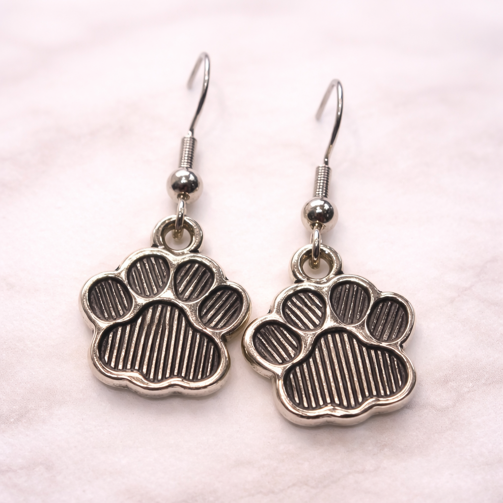 Paw print dangle earrings with silver-tone pet-inspired design, hypoallergenic and lead-free, from the Jewelry by Sonya Lee collection.
