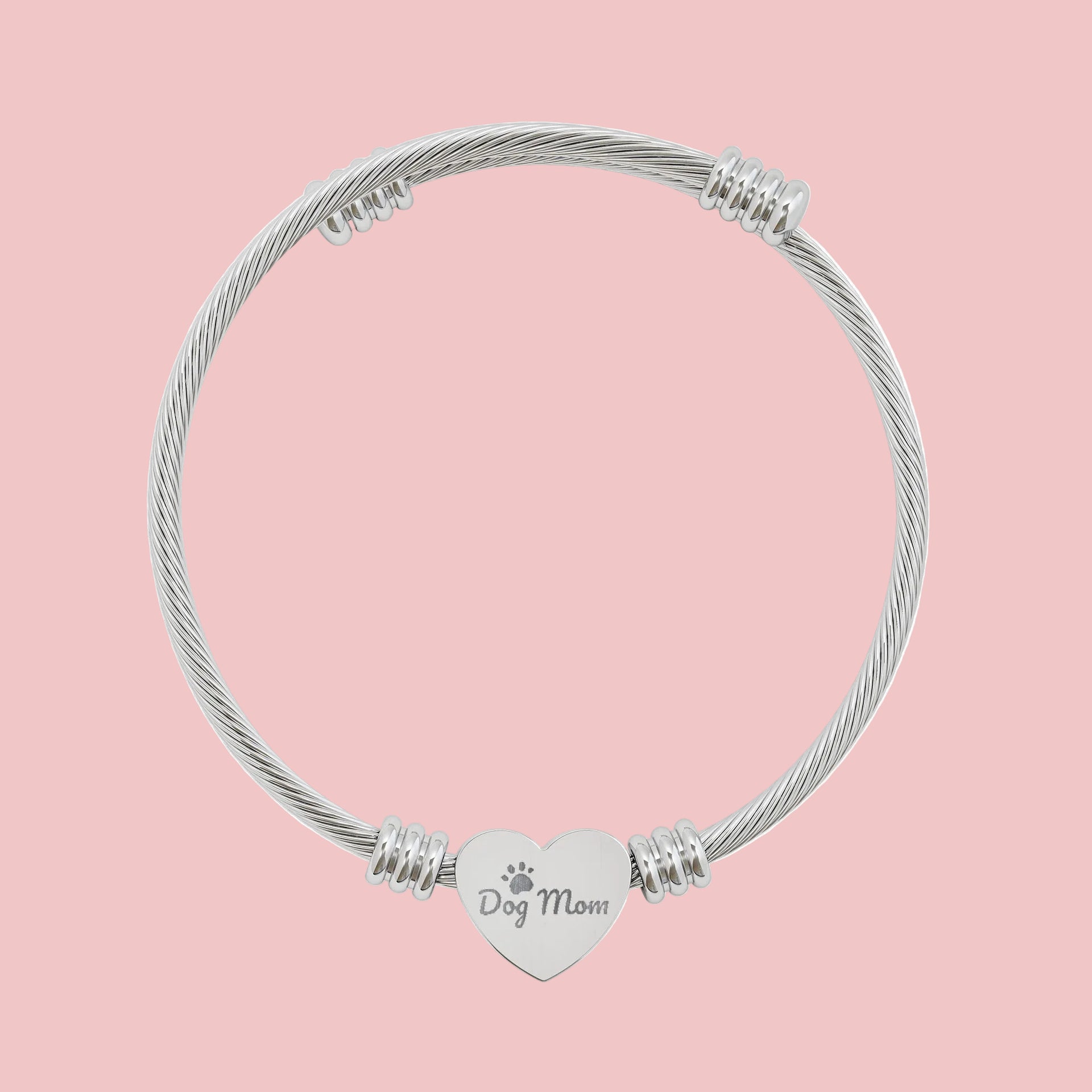 Silver bracelet with a heart-shaped 'Dog Mom' charm on a white background