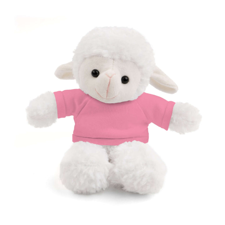 White plush sheep toy wearing a pink shirt on a white background