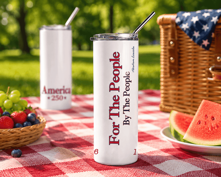 Patriotic America 250 stainless steel tumbler featuring “For The People, By The People” on picnic blanket with watermelon and outdoor summer setting