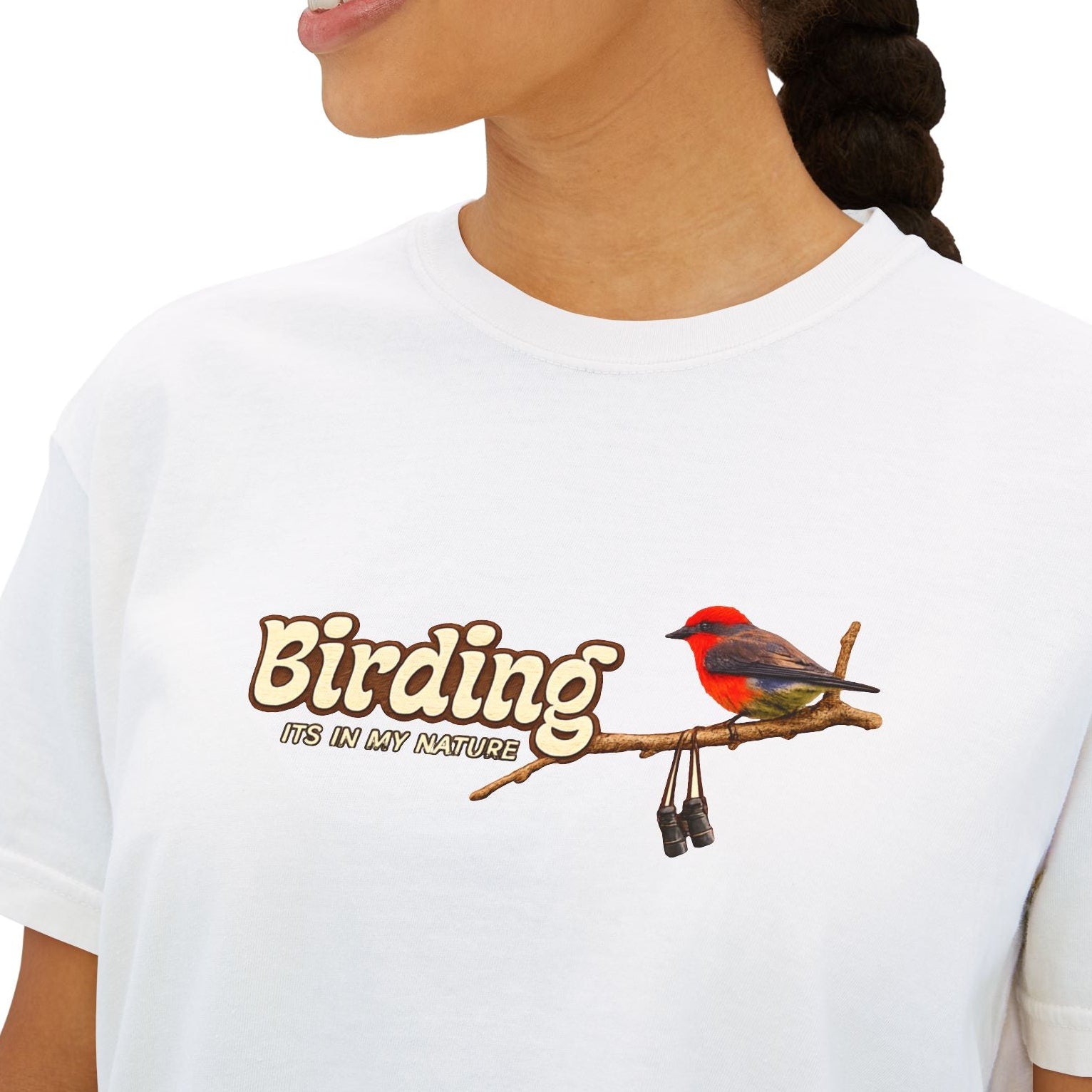 Close-up of white Birding It's My Nature graphic tee featuring colorful bird illustration