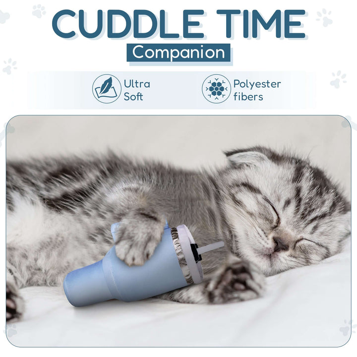 Kitty cuddling with a cat tumbler toy with catnip, showcasing its ultra-soft design and polyester fibers.