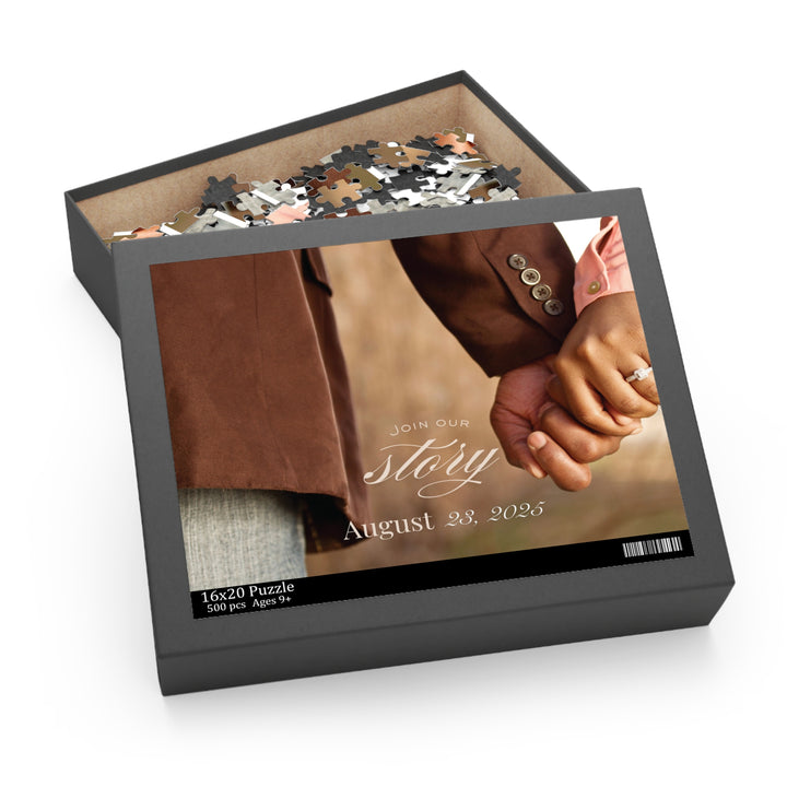 Customized jigsaw puzzle in a box with the image of a two hands holding each other, announcing a wedding 