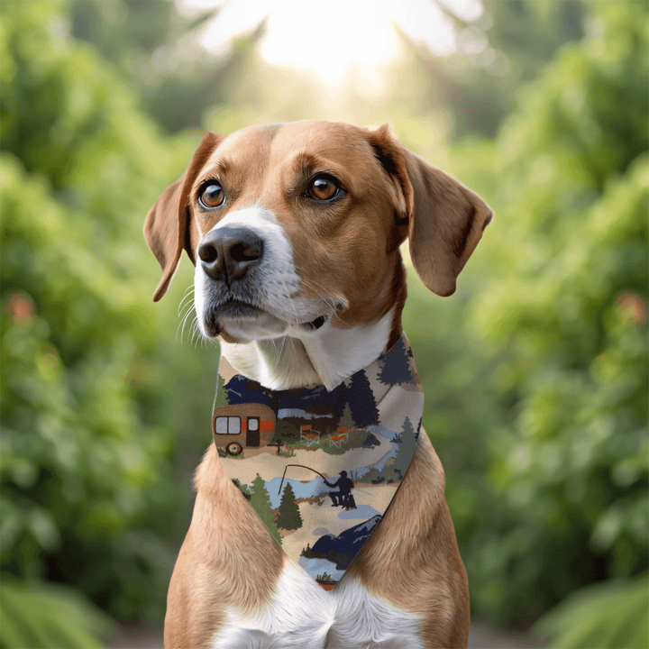 Brown and white dog wearing camping themed bandana with trailer, fishing, and forest design in outdoor portrait setting