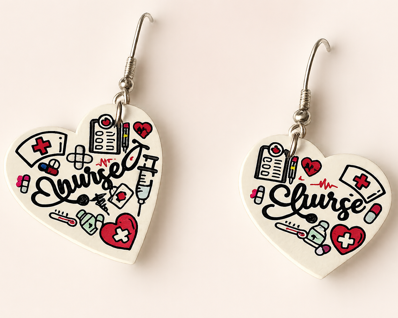 Heart shaped nurse appreciation earrings with medical icons and silver hooks by Jewelry by Sonya Lee