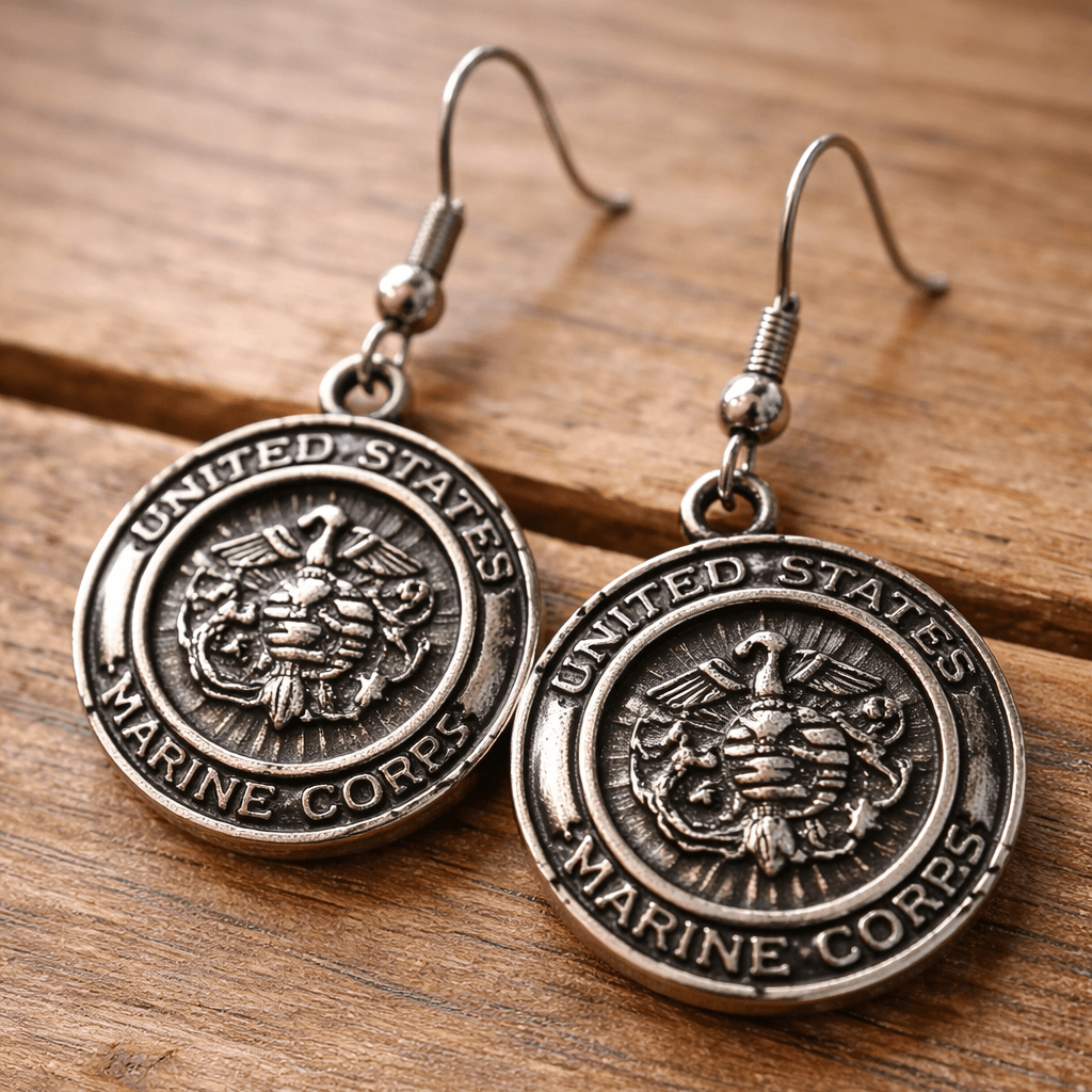 Pair of United States Marine Corps earrings on a wooden surface - gifts that give back