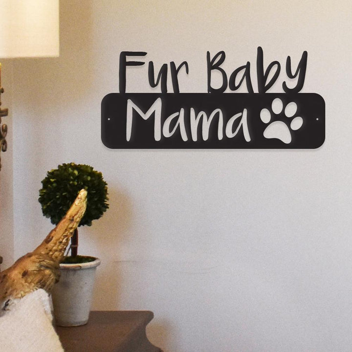 Modern black metal “Fur Baby Mama” wall sign with paw print design displayed in cozy home decor setting, perfect gift for dog moms, cat moms, and pet lovers.