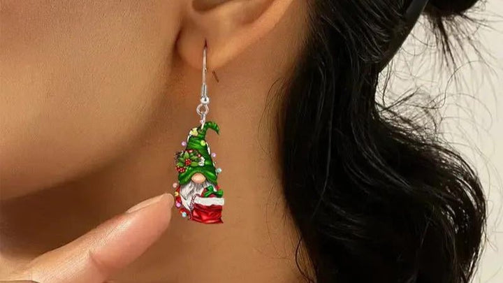 Earring with a Santa Claus design on a neutral background