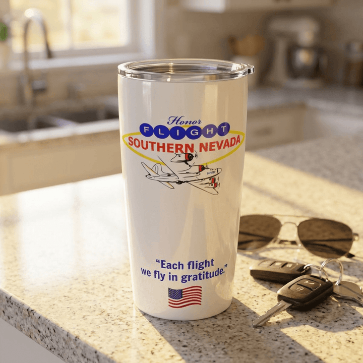 Honor Flight Southern Nevada 20oz stainless steel travel mug on kitchen counter with patriotic veteran tribute design