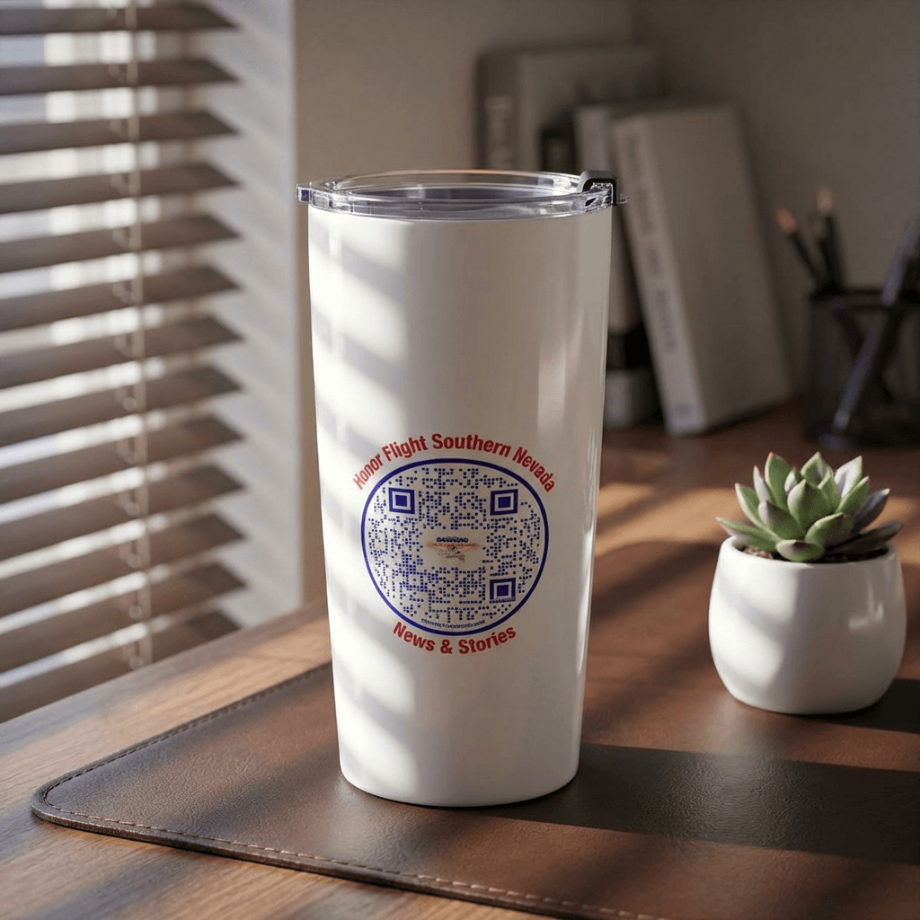 HFSN White tumbler with a QR logo on a wooden desk with a plant and blinds in the background