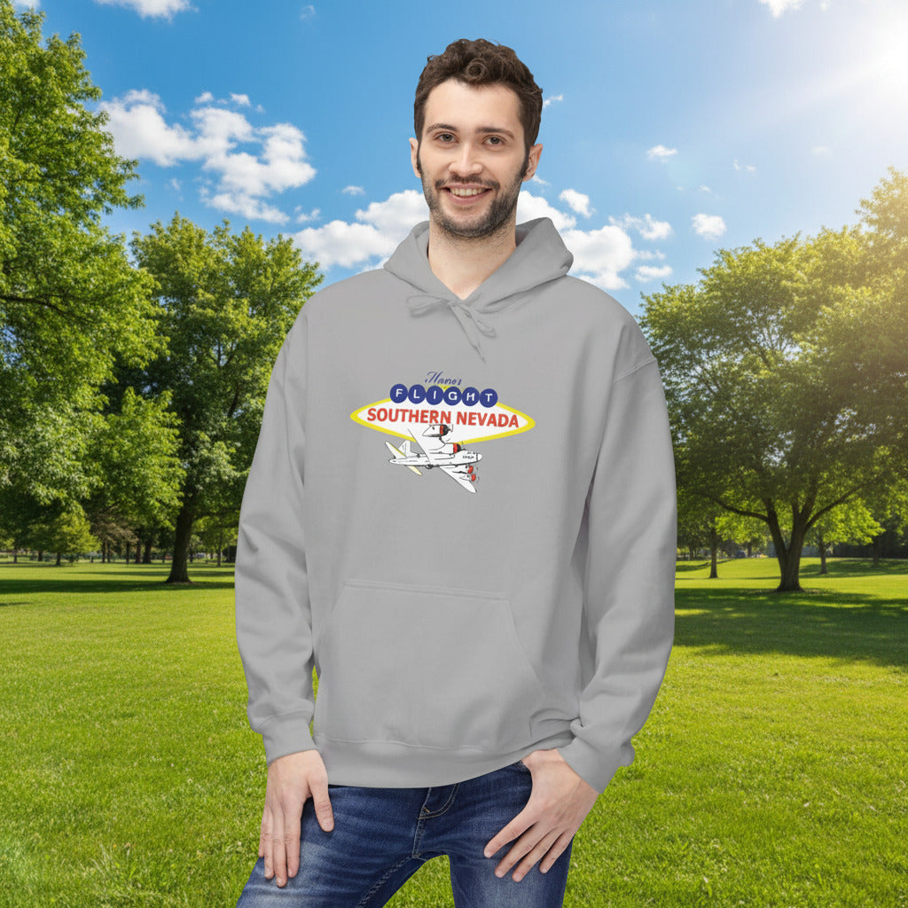 Man wearing gray Honor Flight Southern Nevada hoodie featuring airplane logo and vintage sign design, comfortable unisex sweatshirt supporting veterans and volunteer programs.