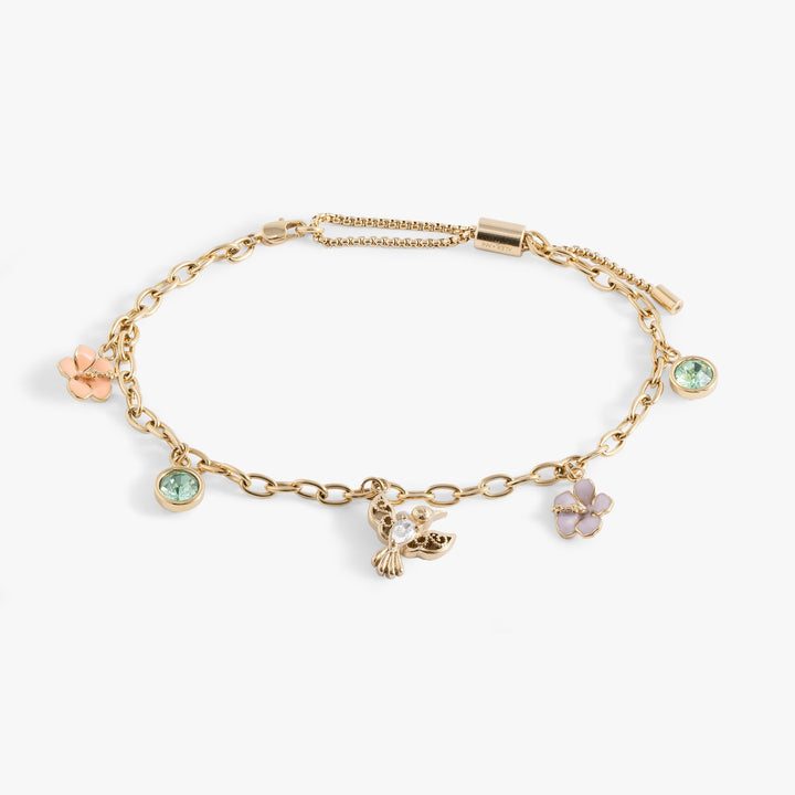 Hummingbird Multicharm Adjustable Anklet with crystal charms and floral accents in gold.