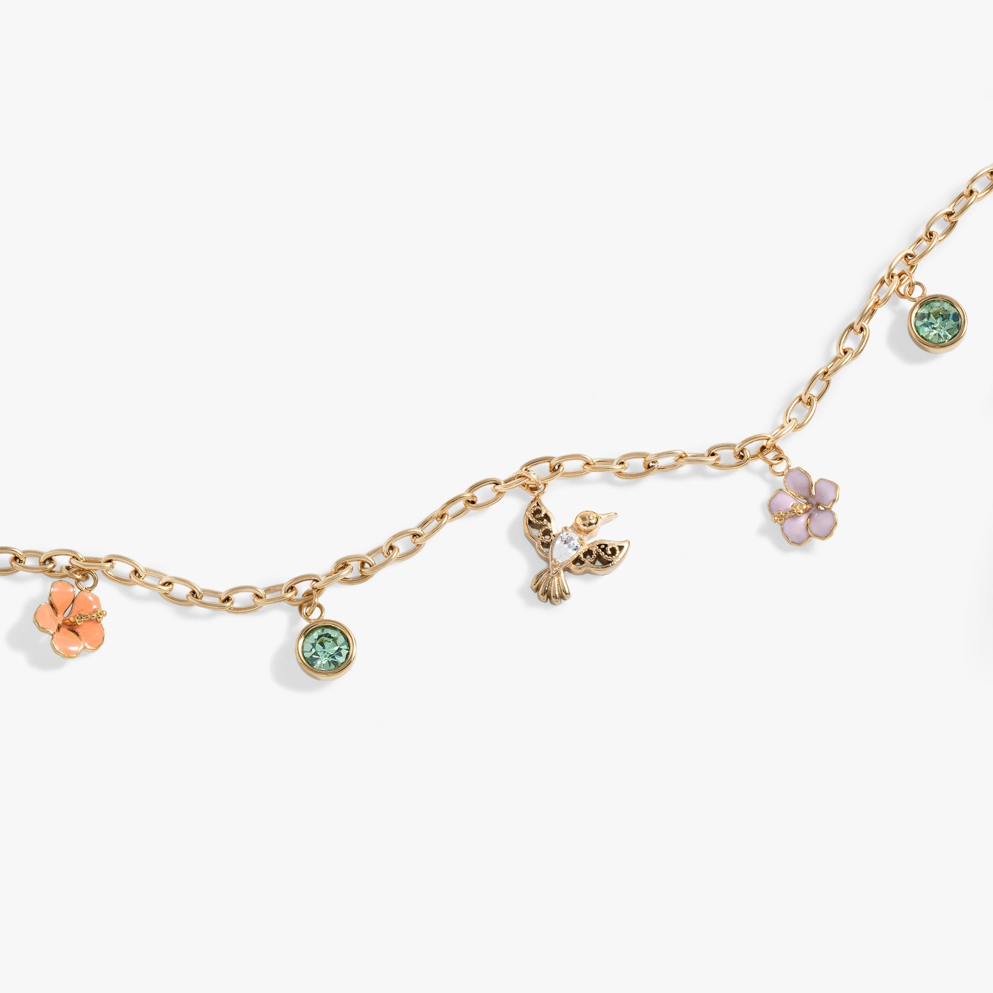Hummingbird multicharm adjustable anklet featuring hibiscus and chrysolite charms, ideal for stylish accessorizing.