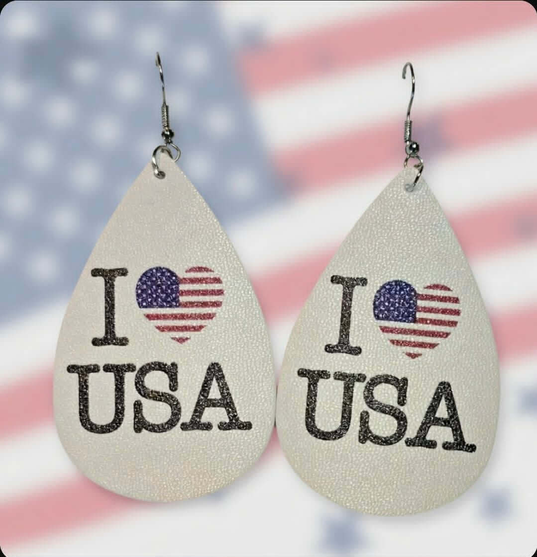 Patriotic faux leather earrings featuring I love USA design with American flag colors.