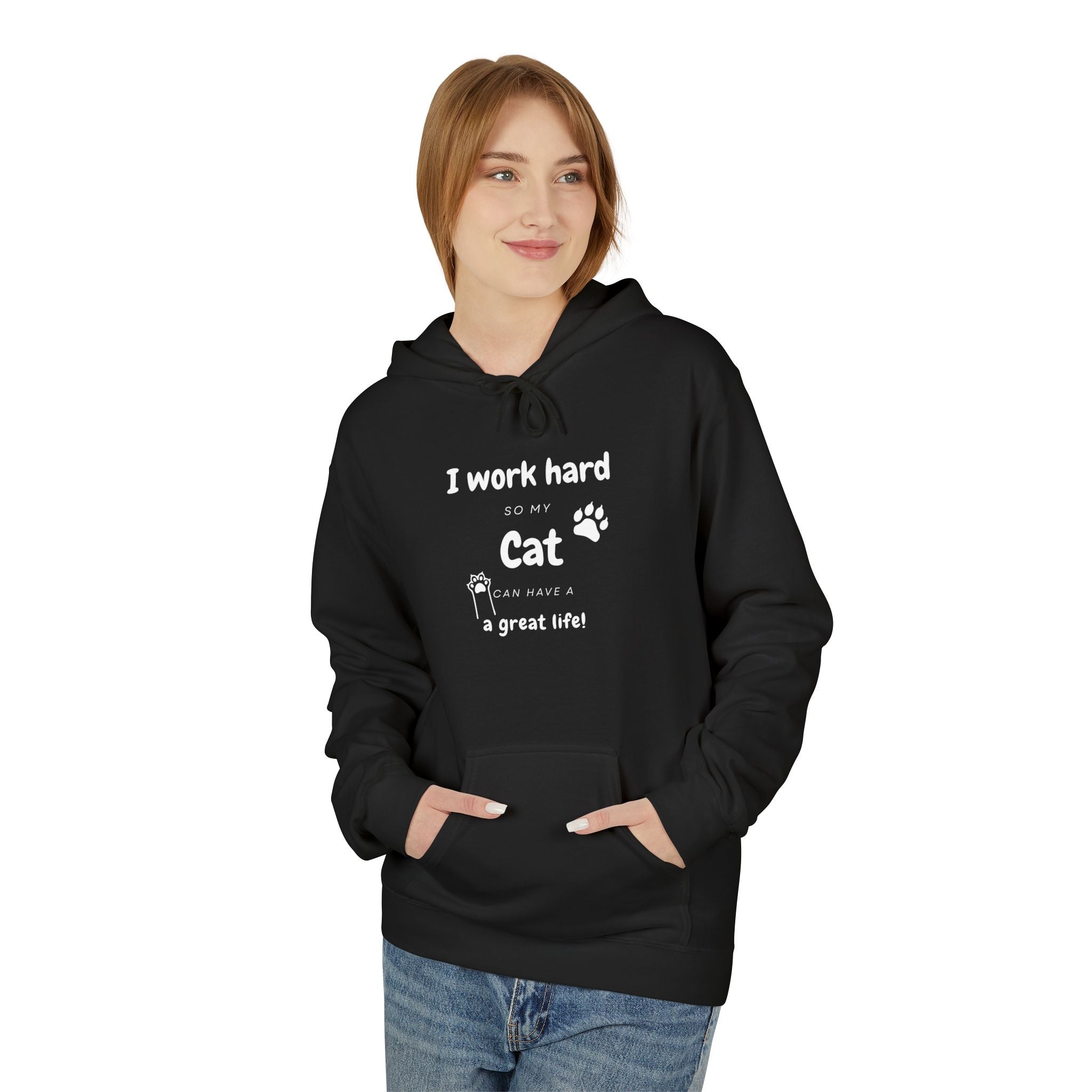 Woman wearing black hoodie with text “I work hard so my cat can have a great life,” featuring cat paw print — cozy cat lover gift sweatshirt.