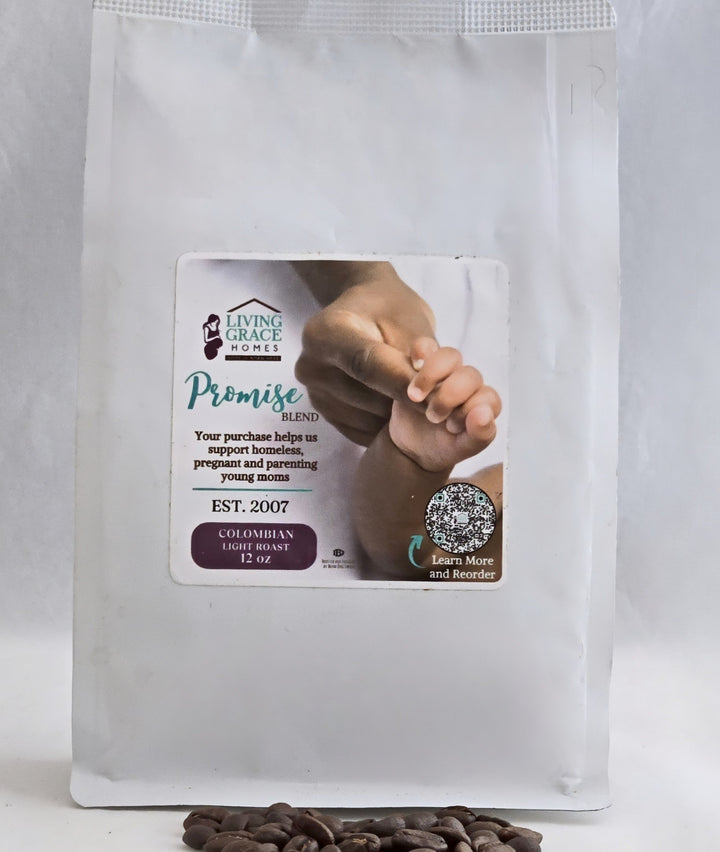 Bag of Living Grace Homes Promise Blend coffee featuring an image of a mother holding a baby’s hand and text supporting homeless, pregnant, and parenting young moms. Colombian light roast 12 oz bag benefiting nonprofit housing and support programs.