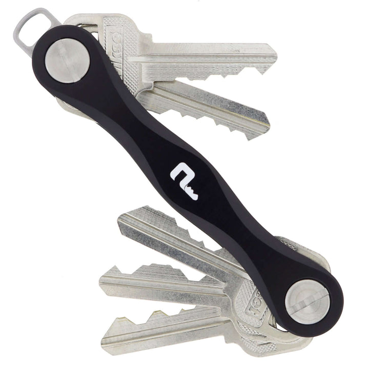 PocketPro Edge slim aluminum key organizer holding multiple keys in compact quiet pocket-friendly black design