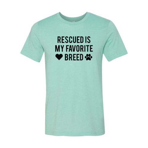 Rescued Is My Favorite Place T-Shirt in mint green with black text and paw print design.