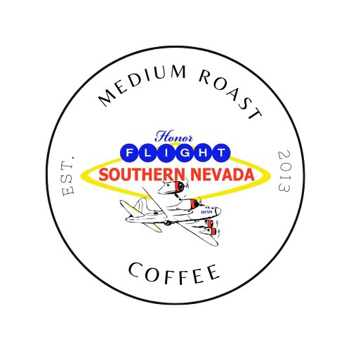 A box of single serve coffee pods with a 'Honor Flight Southern Nevada Coffee Program' label, featuring an American flag design, placed outdoors next to an American flag.